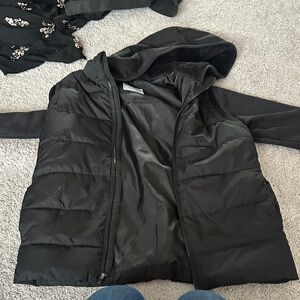 Black Hooded Puffer Vest Style Jacket with attached sleeves